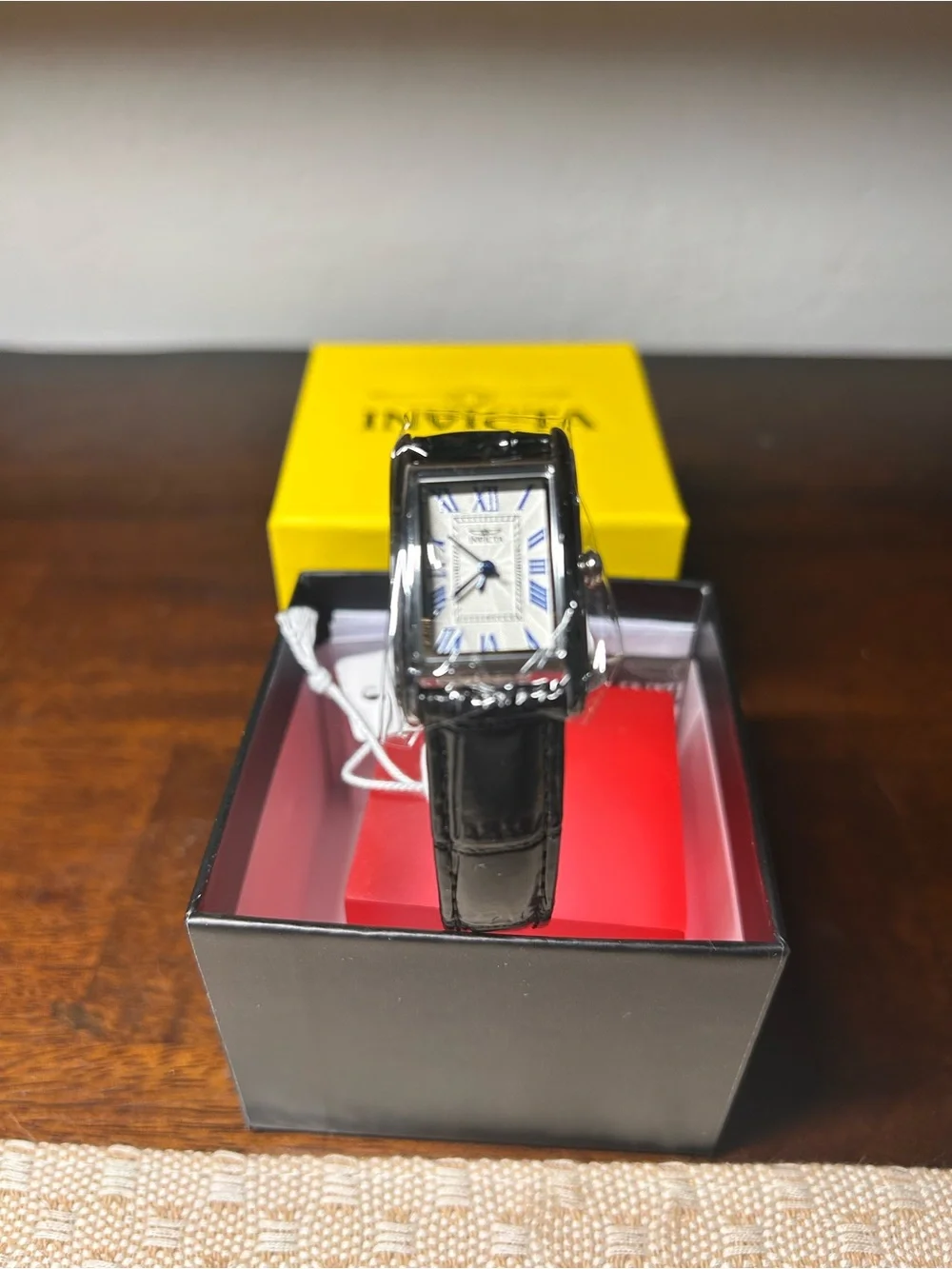 Invicta Men’s Silver Rectangular Watch with Blue Accents and Black Leather Strap